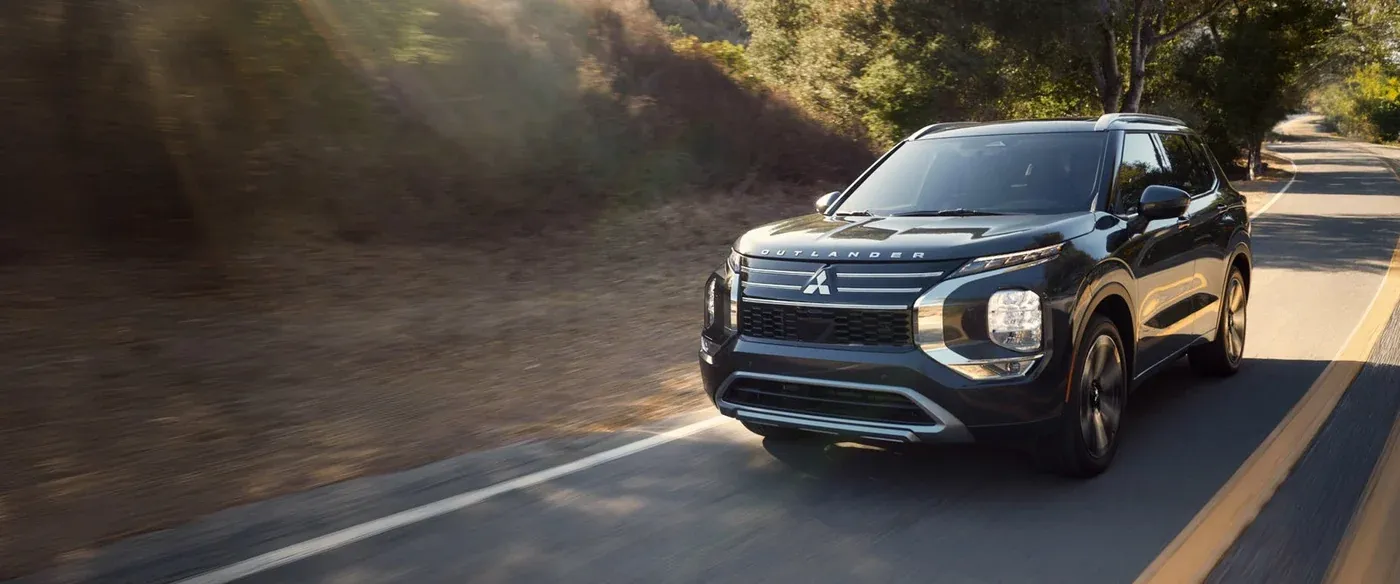 Mitsubishi Outlander on the road - 10-year powertrain warranty coverage at El Cajon Mitsubishi